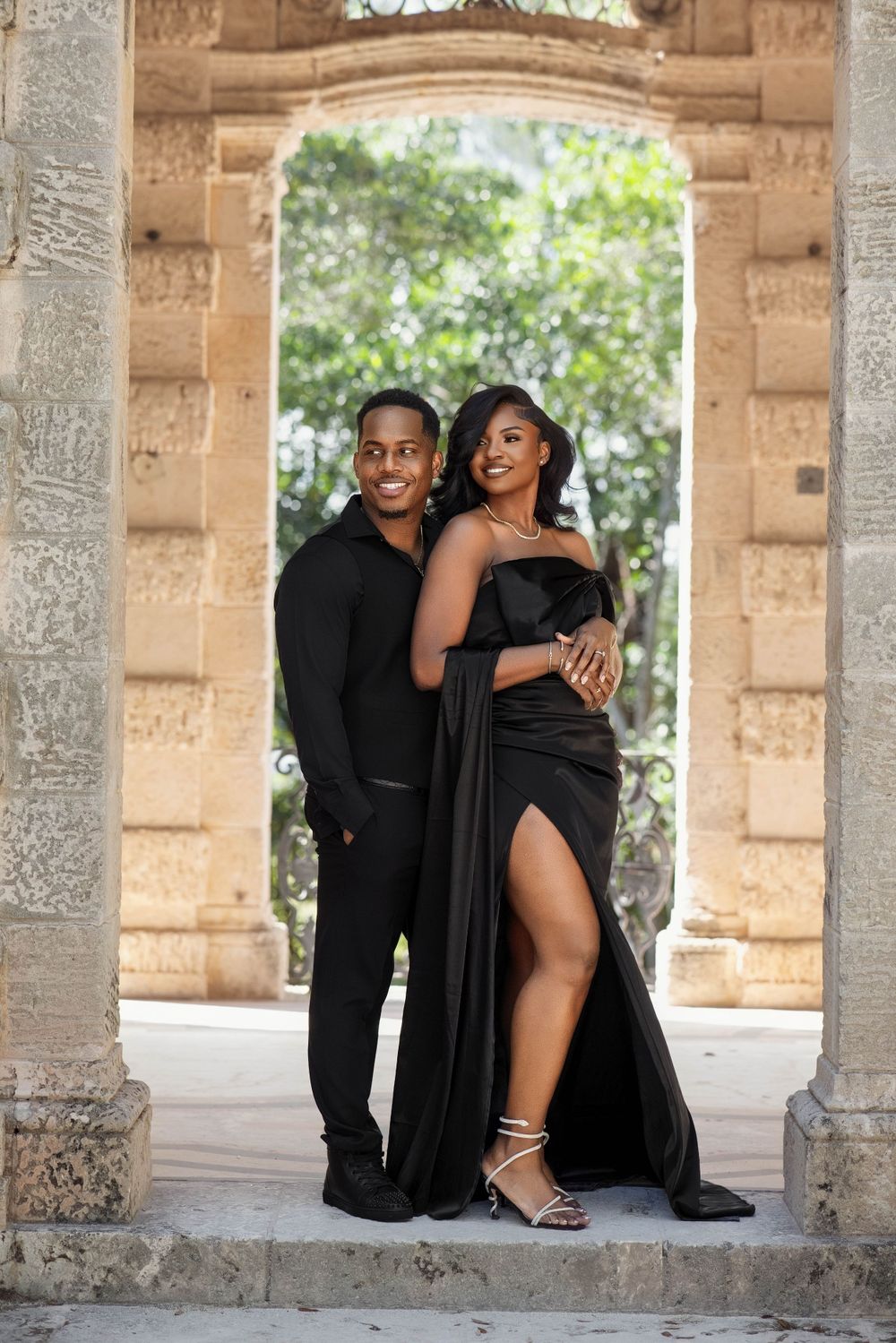 South Florida engagement session — couple in elegant black formalwear