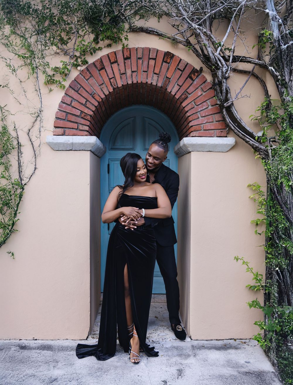 South Florida engagement session — couple in elegant black formalwear