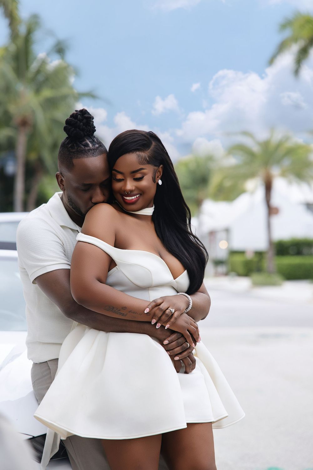 Miami engagement session — couple in elegant black formalwear