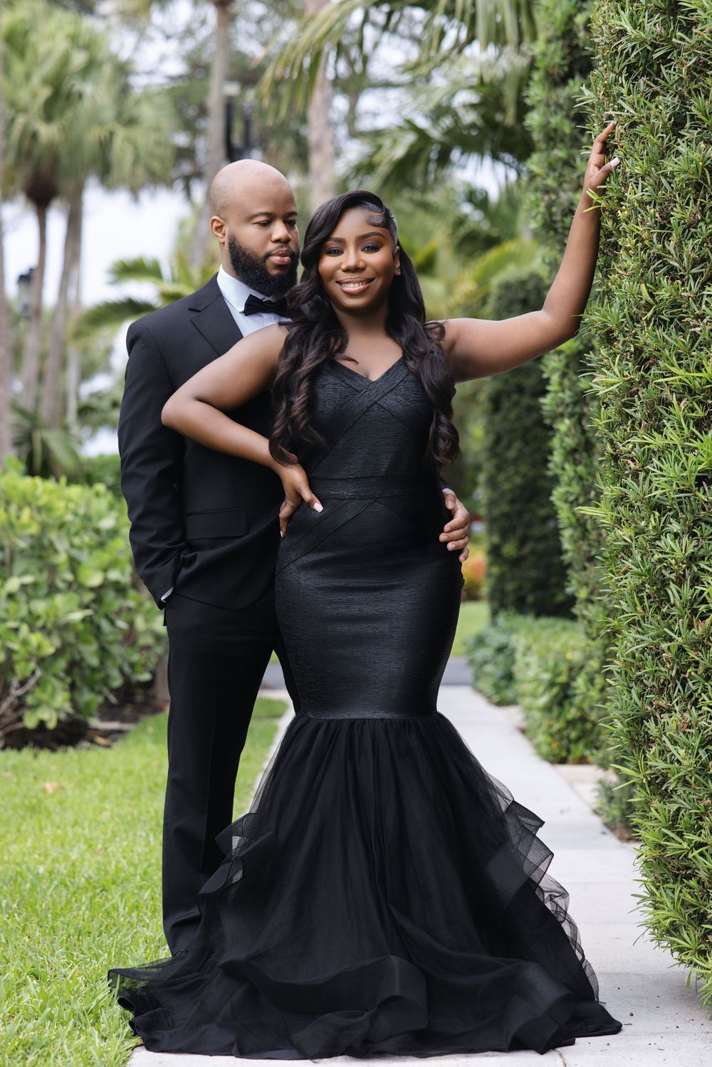 Palm Beach engagement session — couple in elegant black formalwear
