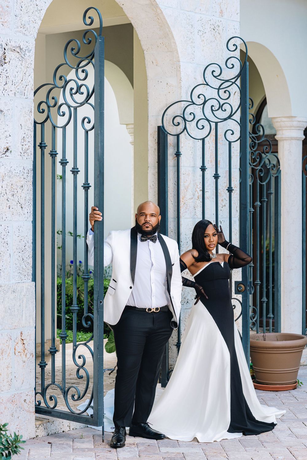 South Florida engagement session — couple in elegant black formalwear