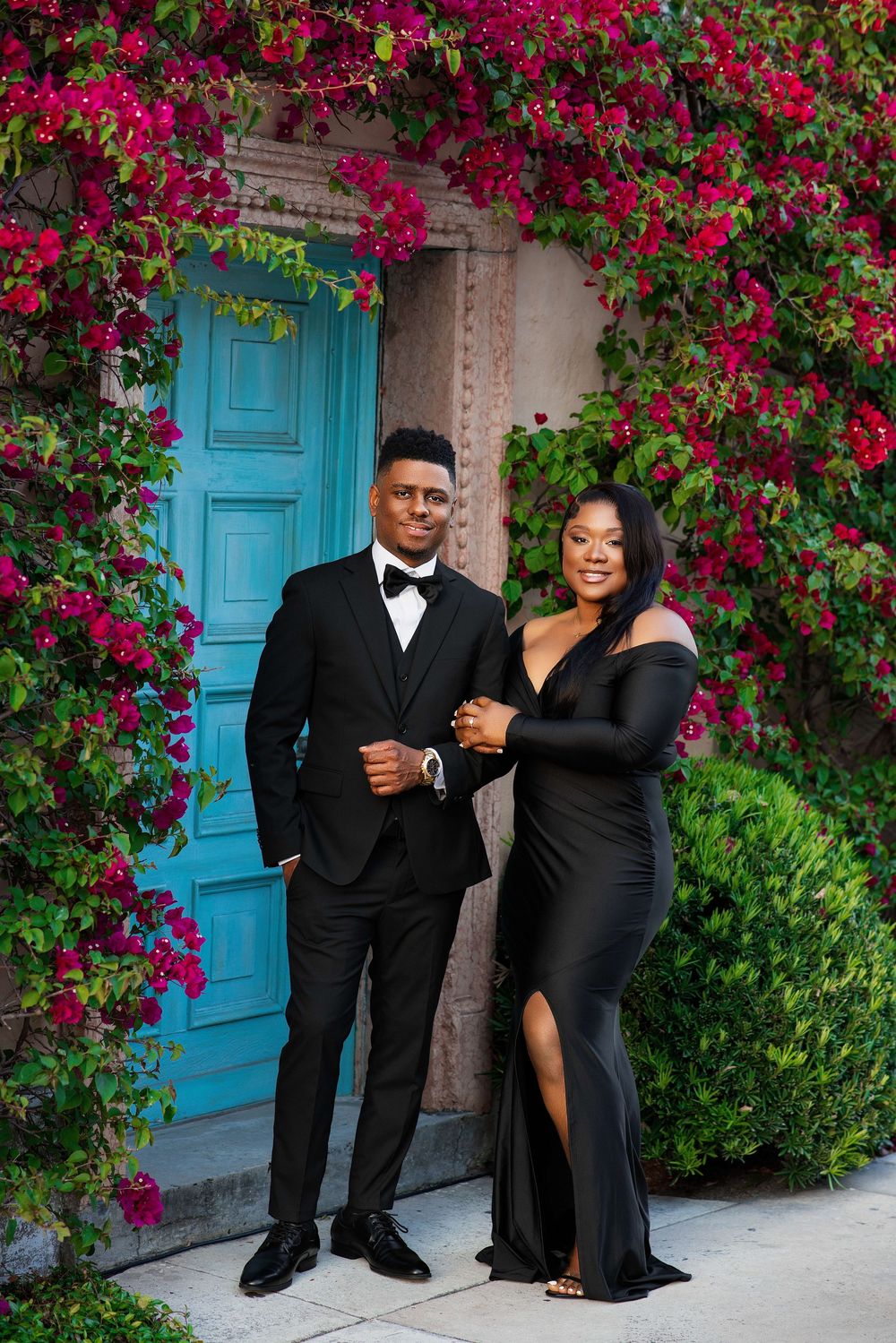 South Florida engagement session — couple in elegant black formalwear