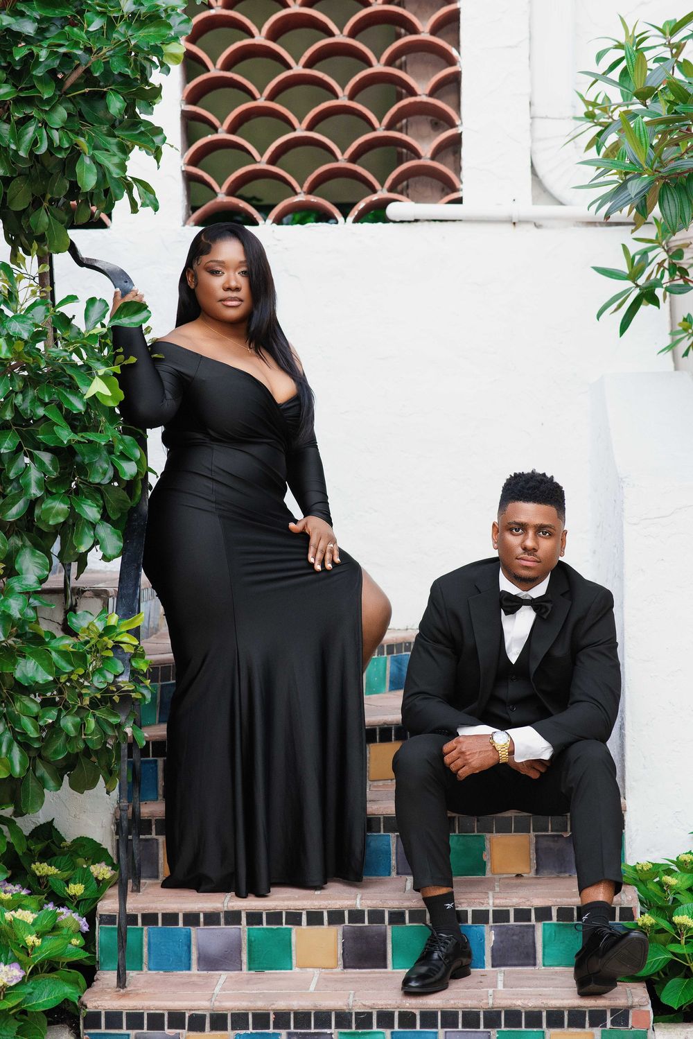 South Florida engagement session — couple in elegant black formalwear