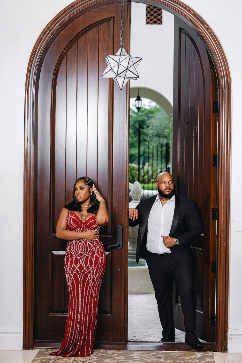 Miami engagement photos — couple in a red evening look
