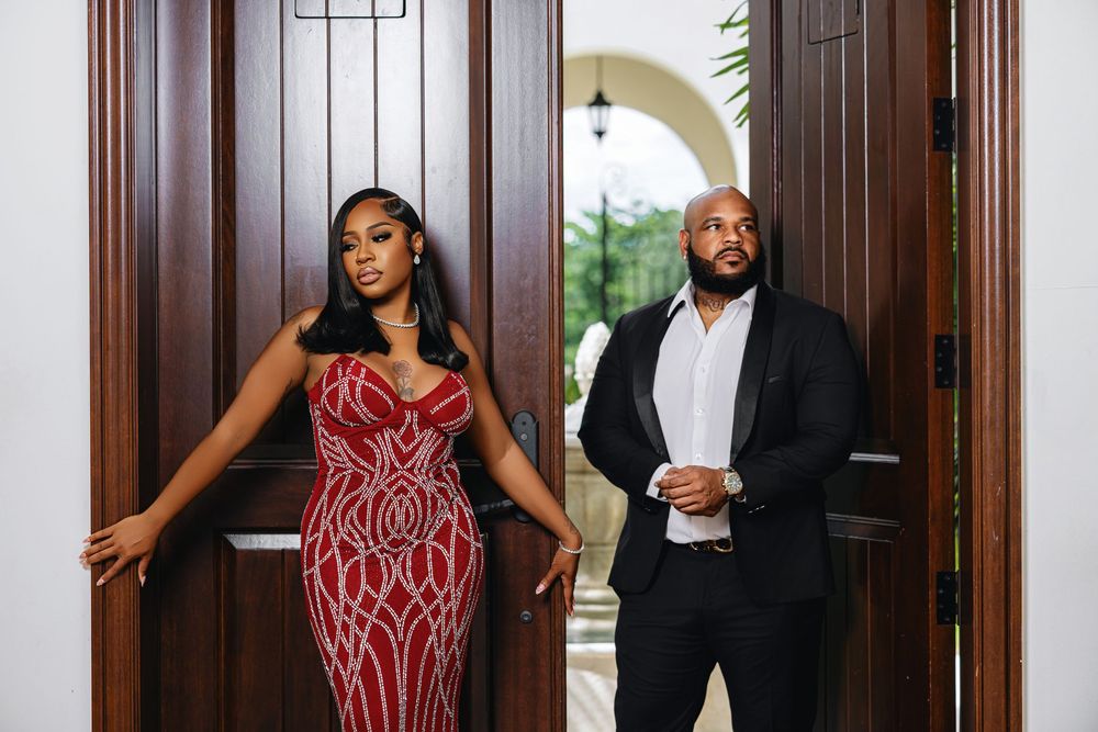 Miami engagement photos — couple in a red evening look
