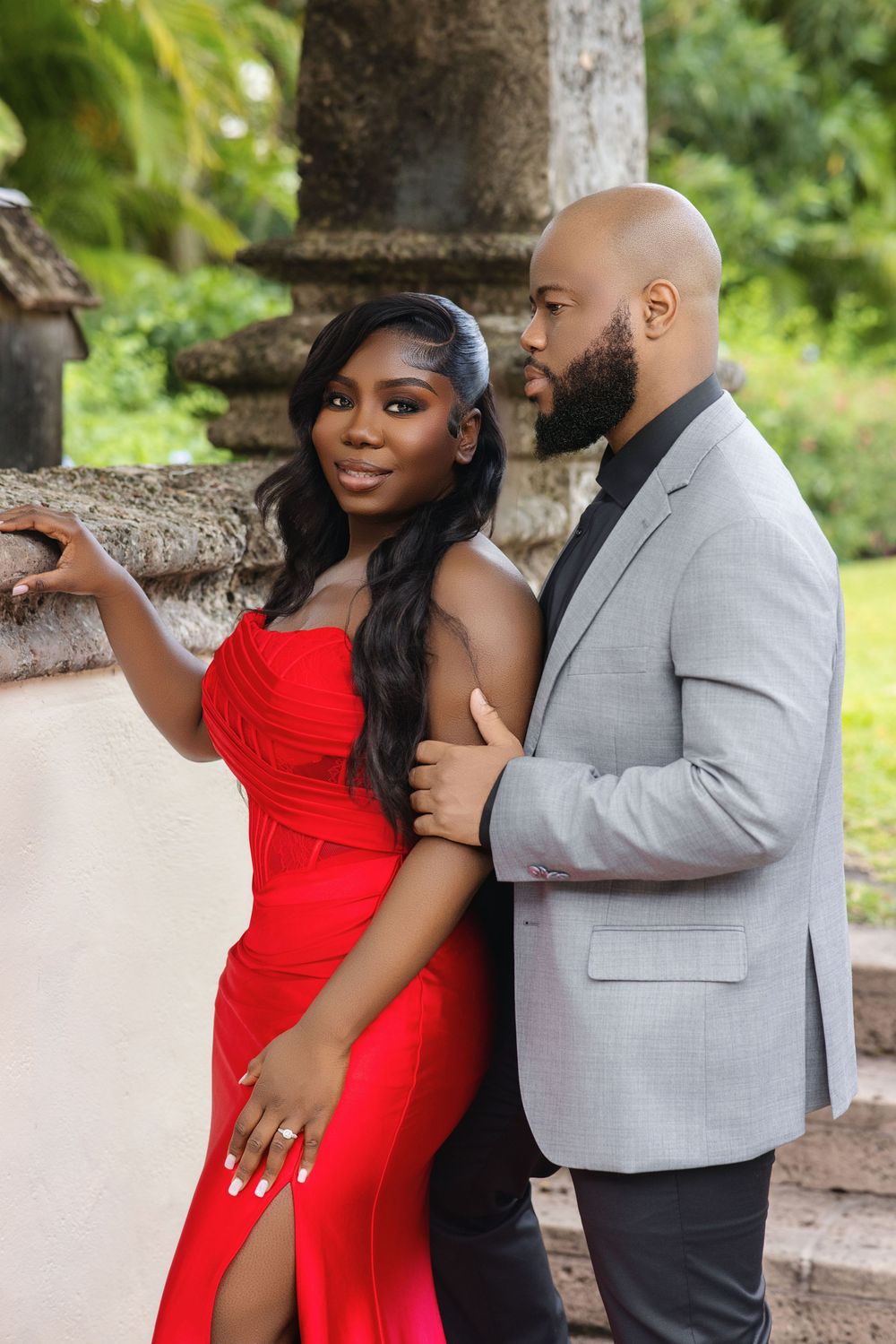 Palm Beach engagement photos — couple in a red evening look