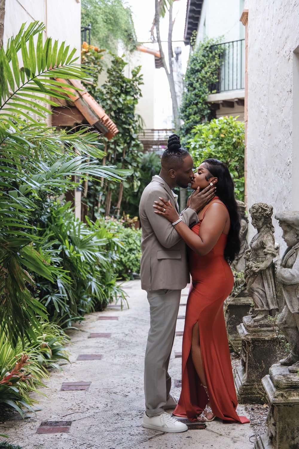 South Florida engagement session — couple in a rust-orange look