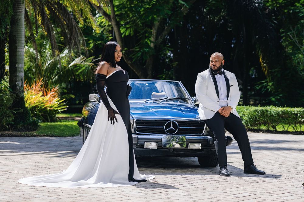 Editorial engagement portrait — couple in white