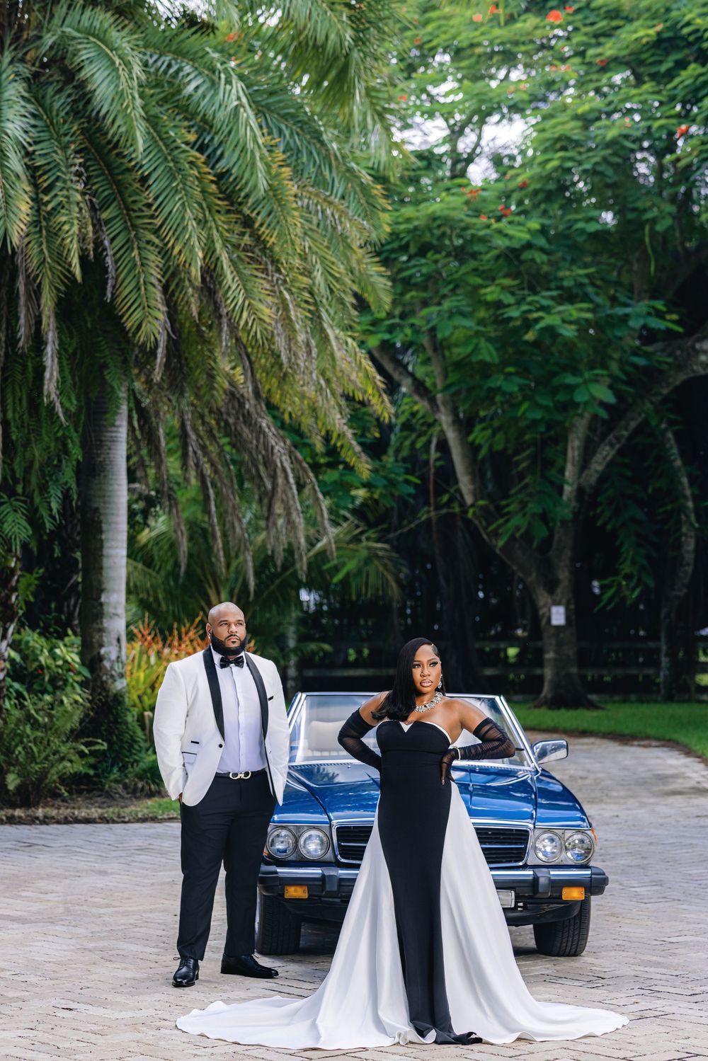 Editorial engagement portrait — couple in white