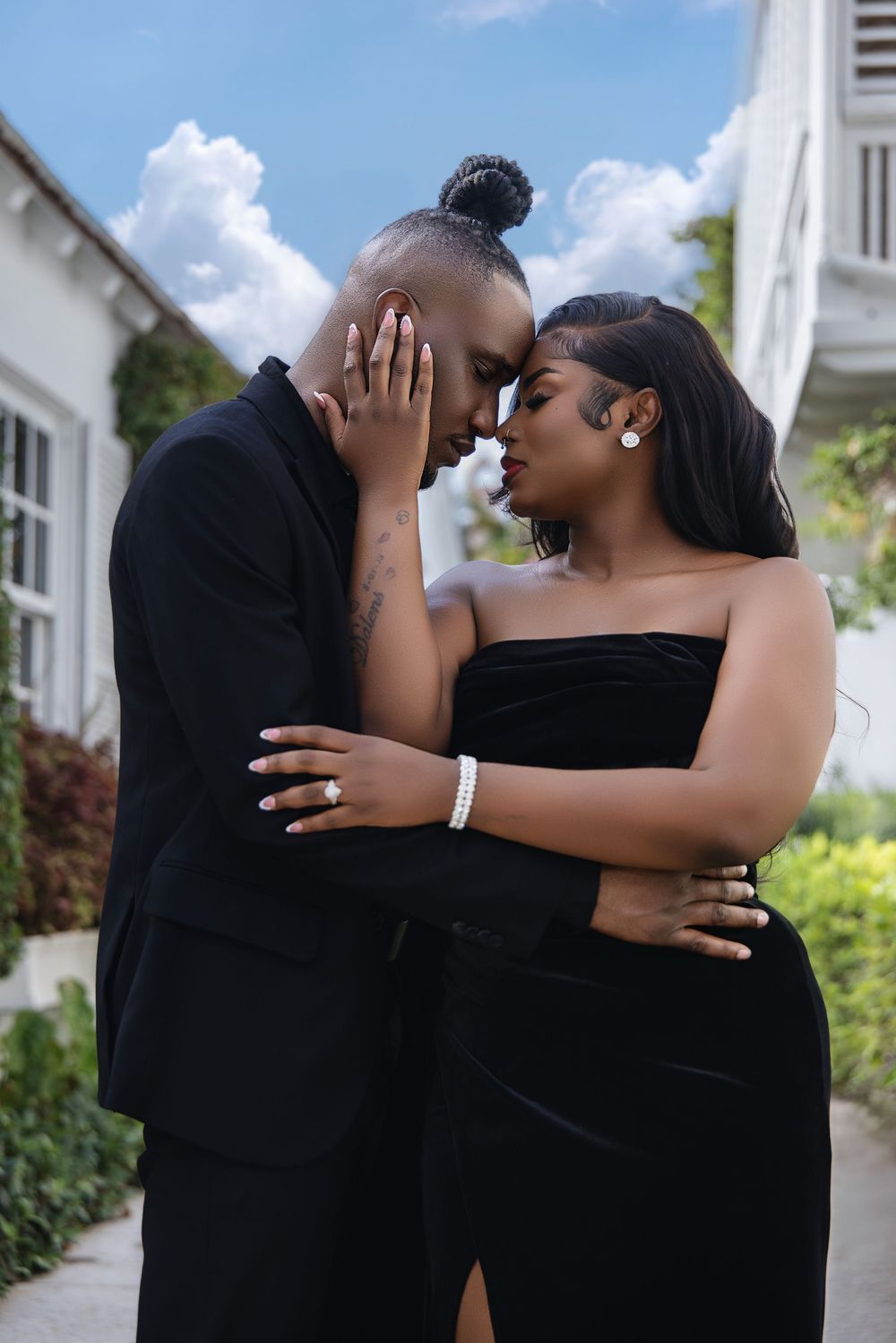 South Florida engagement session — couple in elegant black formalwear